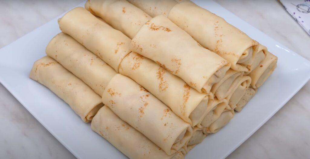 Тонкі млинці з м'ясом: тісто просто дивовижне. Хоч обсмажуйте, хоч запікайте