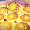 Сирники у сметанній заливці